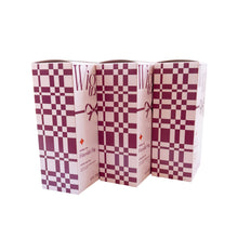 Load image into Gallery viewer, Three Fireside Fig holiday tea boxes, stacked side-by-side at an angle.