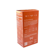 Load image into Gallery viewer, English Breakfast holiday tea box, view of the back of the box. Includes a look at steeping instructions, company story, storage information, and nutrition facts.
