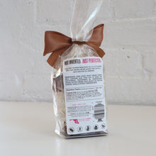 Load image into Gallery viewer, Packaged product with a label on a light gray background
